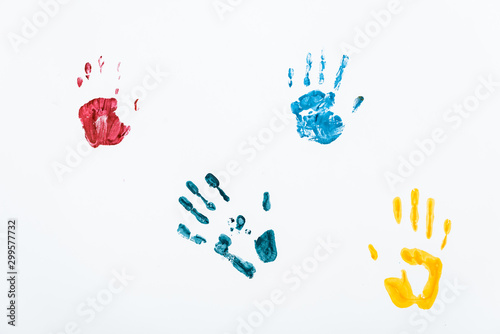 yellow, blue and red hand prints on white