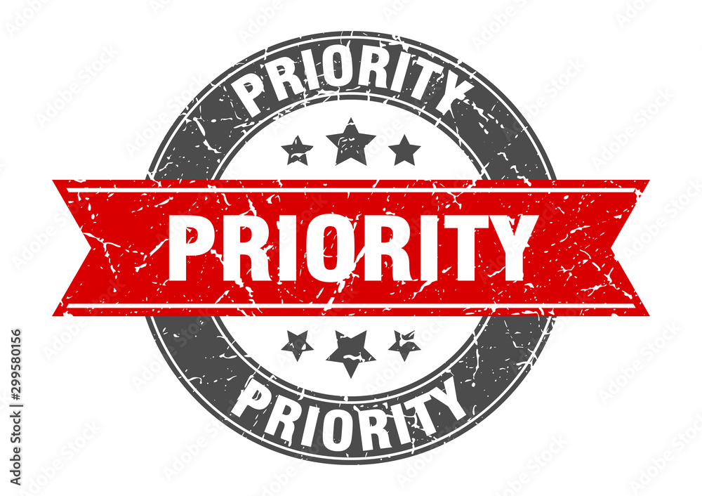 Obraz premium priority round stamp with red ribbon. priority