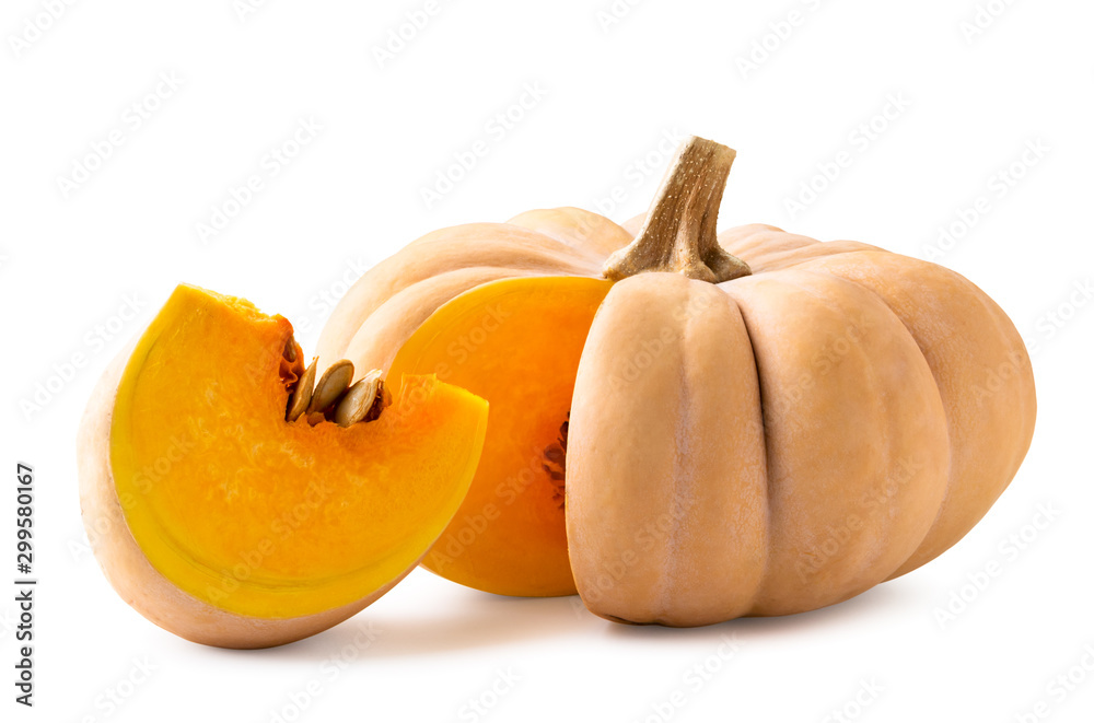 Ripe pumpkin with cut piece on a white background. Isolated.