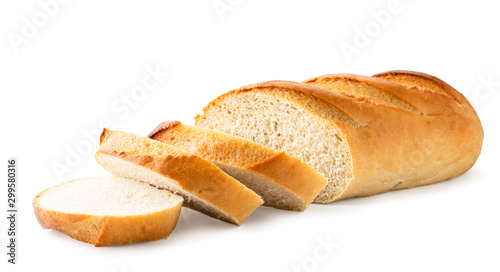Photo Loaf of white bread cut into pieces close-up. Isolated