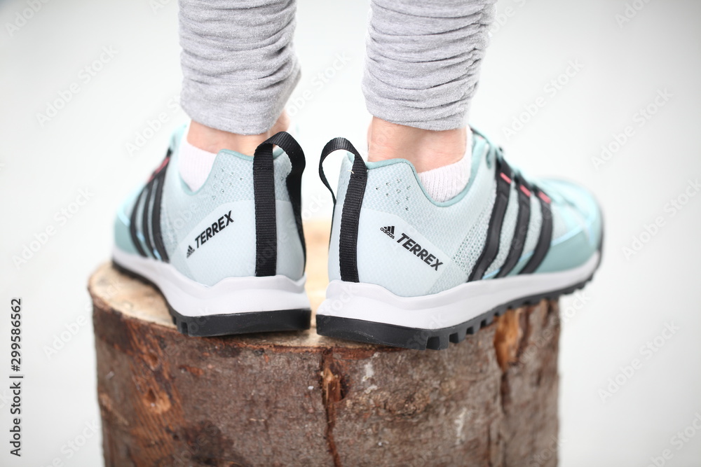 girl in sneakers Adidas terrex training Stock Photo | Adobe Stock