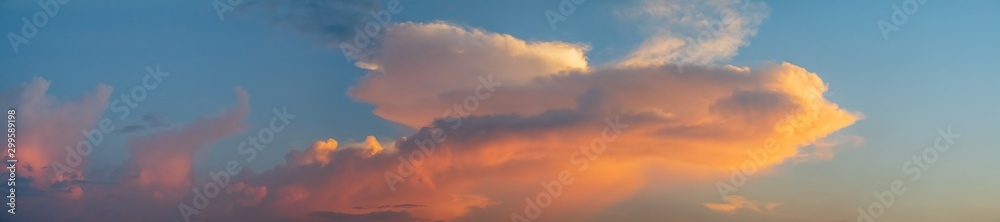 Clouds near sunset before rain blue sky Panoramic
