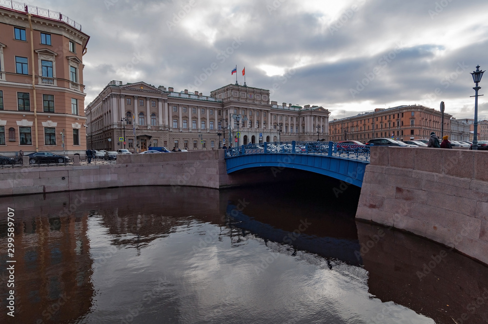 Late autumn, the center of St. Petersburg, view from the embankment to the Blue Bridge and the building of the Mariinsky Palace