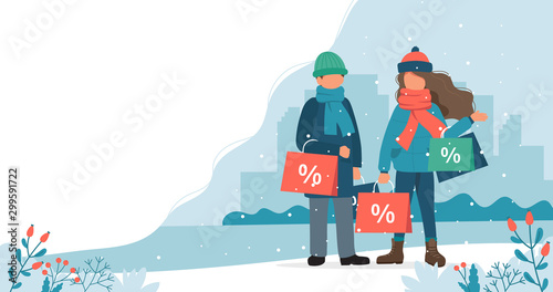 Man and woman with sales bags in winter. Cute vector illustration in flat style.