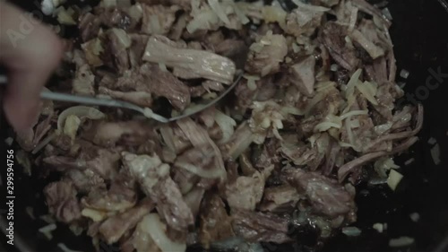 Cooking shredded rib in frying pan