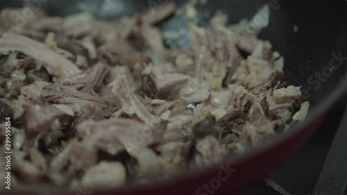 Cooking shredded rib in frying pan