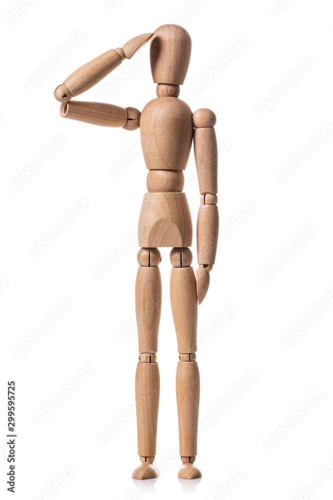 A wooden man isolated on a white background. Gestalt in the form of standing man giving the honor A wooden man isolated on a white background. Gestalt in the form of standing man giving the honor