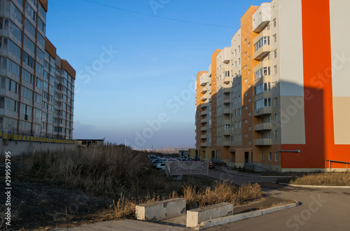 Colorful apartment buildings. New residential area. Ust-Kamenogorsk (Kazakhstan). High-rise multistory apartment buildings