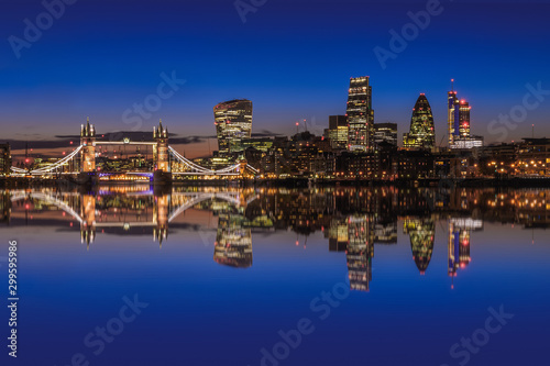 London cityscape with reflection from River Thames at sunset