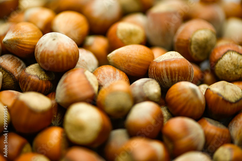 hazelnuts on a wooden background
