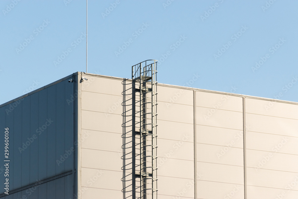 Geometric colored building facade elements with planes, lines and corners with light flare and reflections for an abstract background and texture of white, blue, gray colors. Place for text Geometric colored building facade elements with planes, lines and corners with light flare and reflections for an abstract background and texture of white, blue, gray colors. Place for text