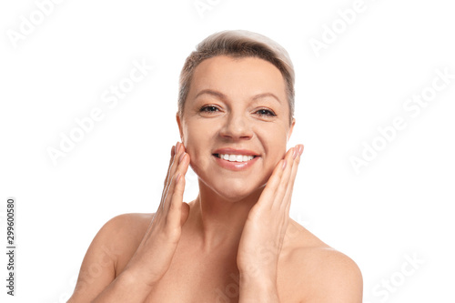 Mature woman with beautiful face on white background