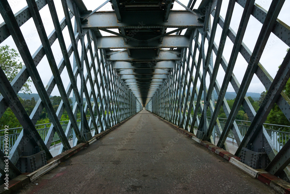 steel iron bridge with crossed lines. road perspective steel iron bridge with crossed lines. road perspective