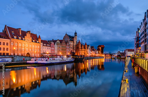 Sightseeing of Poland. Cityscape of Gdansk old town with beautiful reflection in the water, night view