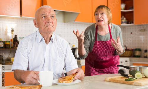 Senior woman scolding her husband