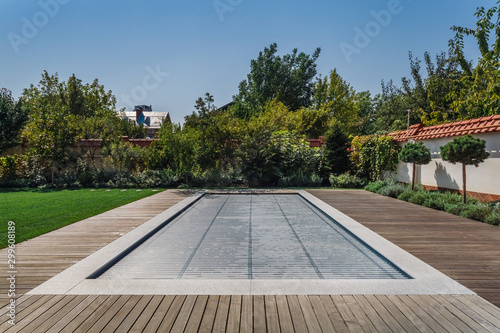 Span for pool. Rolling coating. Pool protection. Rollete. Security. Pure water. Pool protection system.