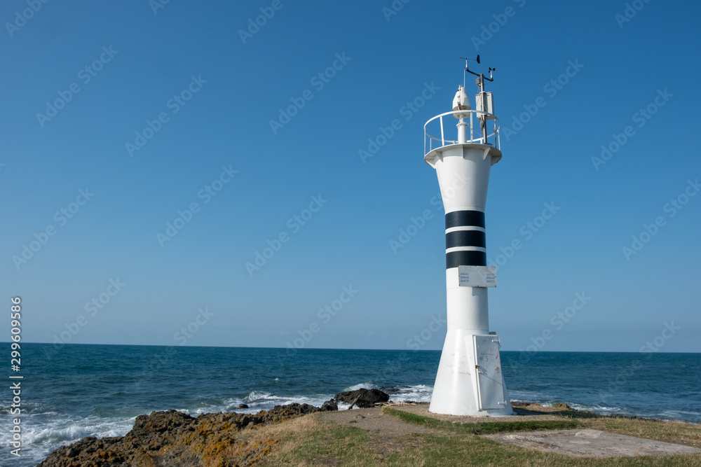 Lighthouse near the sea Lighthouse near the sea