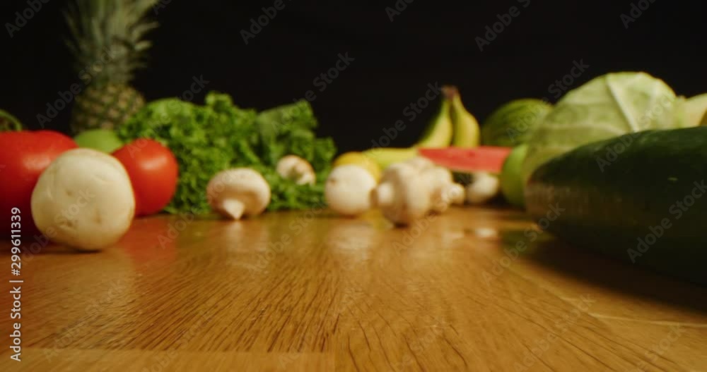 Scattering mushrooms on table macro shot, composition of fruits and vegetable, sliding in, isolated, slow motion, shot on Red Weapon Helium 8k Scattering mushrooms on table macro shot, composition of fruits and vegetable, sliding in, isolated, slow motion, shot on Red Weapon Helium 8k