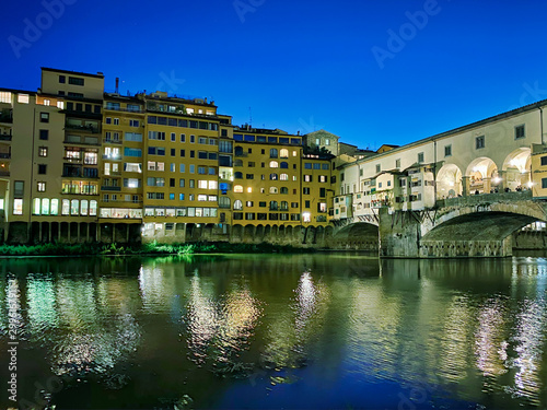 Old Bridge and Florence Lungarni at night. Panoramic cityscape in Autumn  Tuscany - Italy