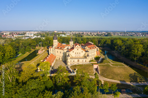 Nesvizh Castle is a residential castle of the Radziwill family in Nesvizh, Belarus, beautiful view in the summer against the blue sky