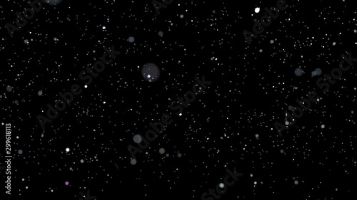 flying sequins on black. slow motion