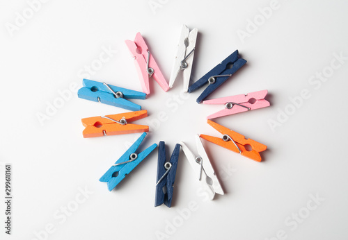 colorful decorative clothespins on a white background