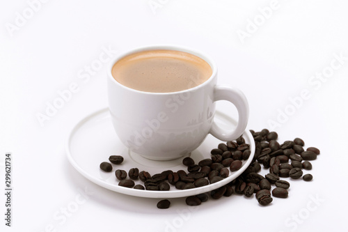 Coffee cup and beans on a white background