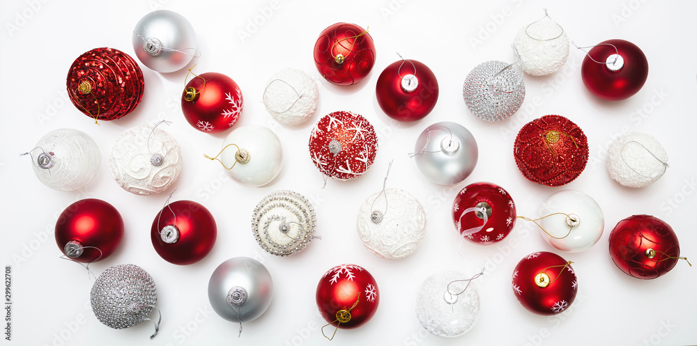 Xmas baubles flat lay against white background Xmas baubles flat lay against white background