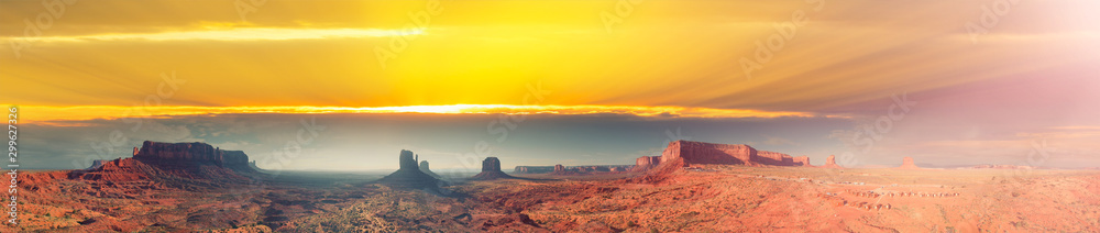 Aerial panoramic view of Monument Valley National Park at summer sunset, United States