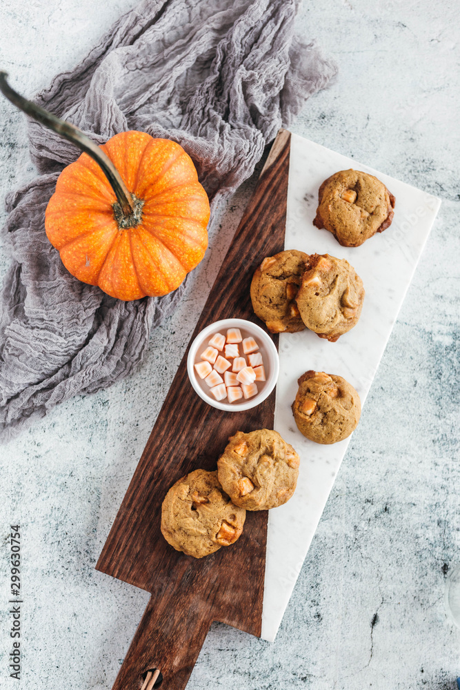 Pumpkin spice truffle cookies on marble and wood serving board Pumpkin spice truffle cookies on marble and wood serving board