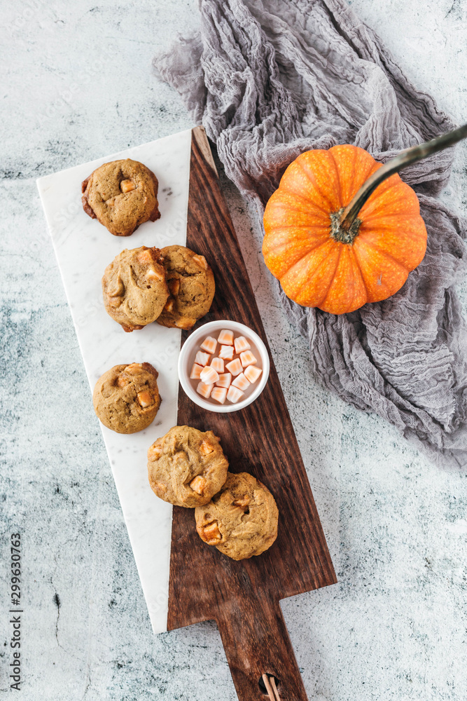 Pumpkin spice truffle cookies on marble and wood serving board Pumpkin spice truffle cookies on marble and wood serving board