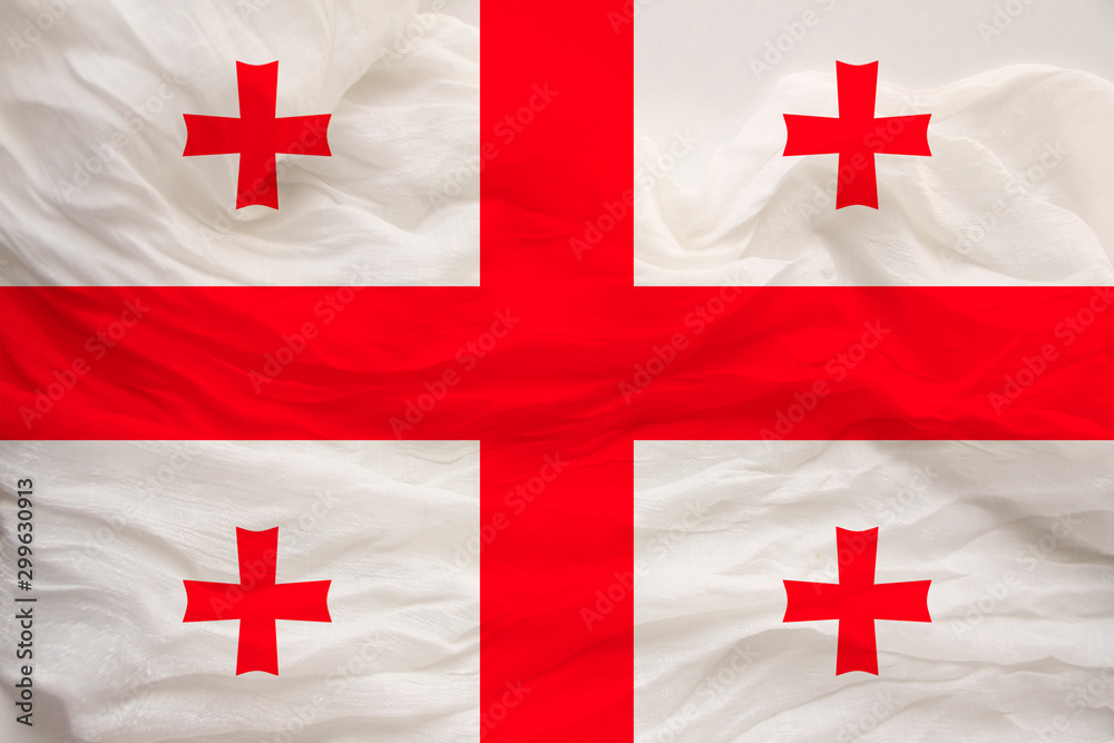 national flag of the country of Georgia on the gentle silk with folds from the wind, the concept of travel, immigration, politics national flag of the country of Georgia on the gentle silk with folds from the wind, the concept of travel, immigration, politics