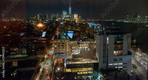 Manhattan streets and Lower Manhattan night aerial skyline, New York City