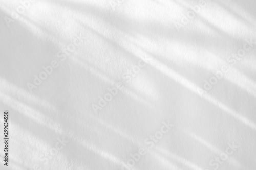 Organic drop diagonal shadow on a white wall, overlay effect for photo and mockups © Aleksandra Konoplya