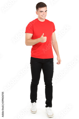 Young man showing thumb up on white background © 5second