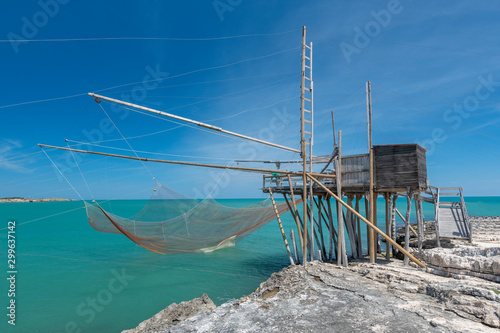 Typical traditional fishing trabucco at the beach of Vieste along the Adriatic Sea in Puglia  Italy.