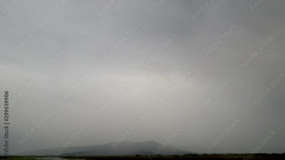 timelapse of rain clouds trough across mountain timelapse of rain clouds trough across mountain