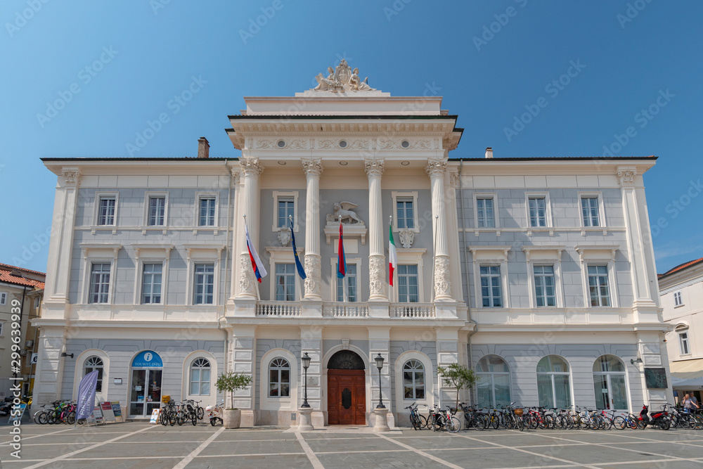 Flags flying outside the Town Hall in Tartini Square in Piran, Slovenia.