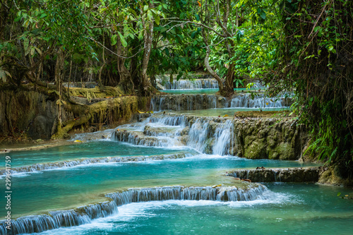 Turquoise water of Kuang Si waterfall  Luang Prabang  Laos. Tropical rainforest. The beauty of nature.