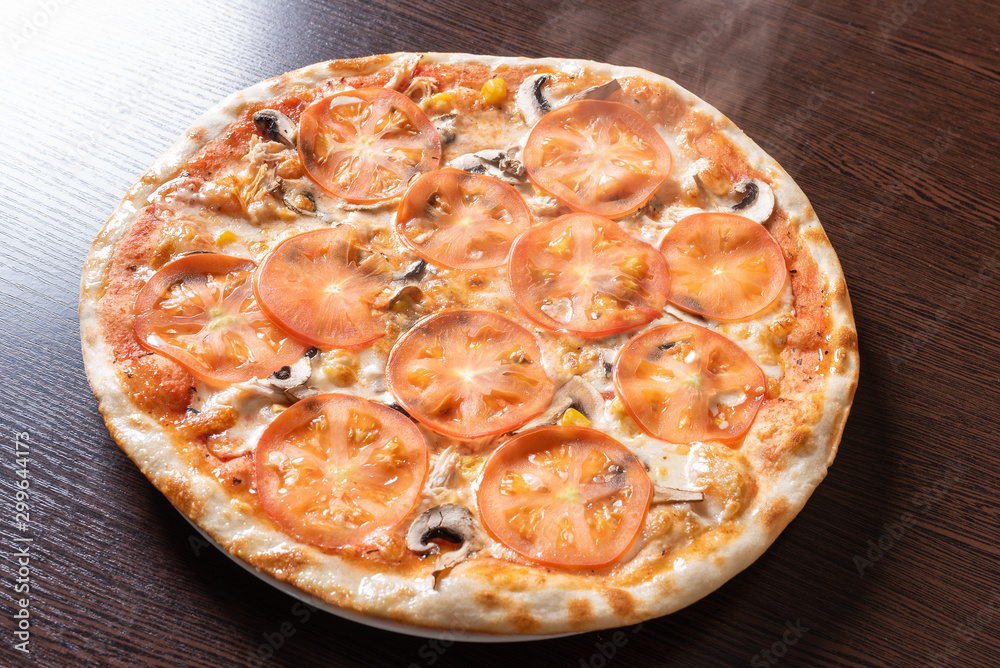 Cheap pizza with mushrooms, tomatoes, and corn.