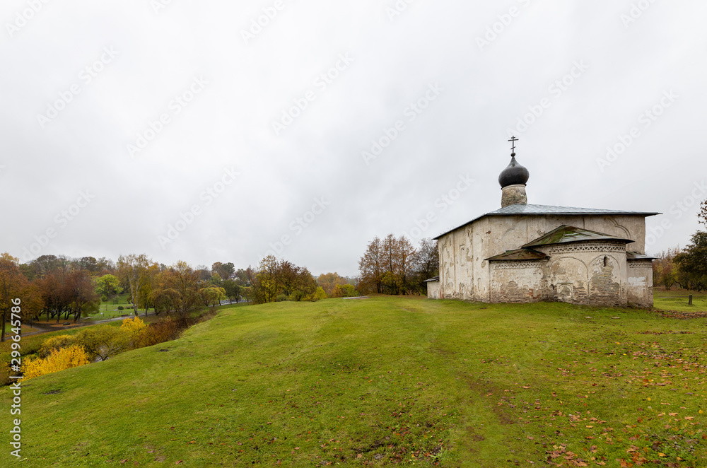 Fototapeta premium Church of Kosma and Domian with Gremyachaya hill, 12th century. Pskov, Russia