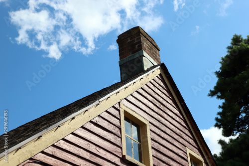 Rustic Wooden Home with Brick Chimney