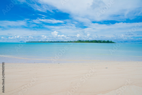 Fototapeta Naklejka Na Ścianę i Meble -  Kayangel main island view from small island shore, calm blue ocean, tropical beach and green island, Palau, Pacific