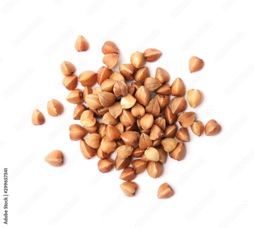 Pile of buckwheat grains isolated on white, top view. Organic cereal Pile of buckwheat grains isolated on white, top view. Organic cereal