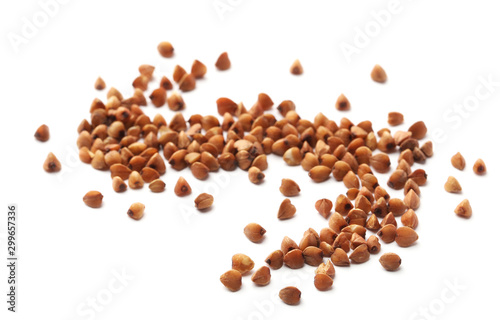Buckwheat grains isolated on white. Organic cereal