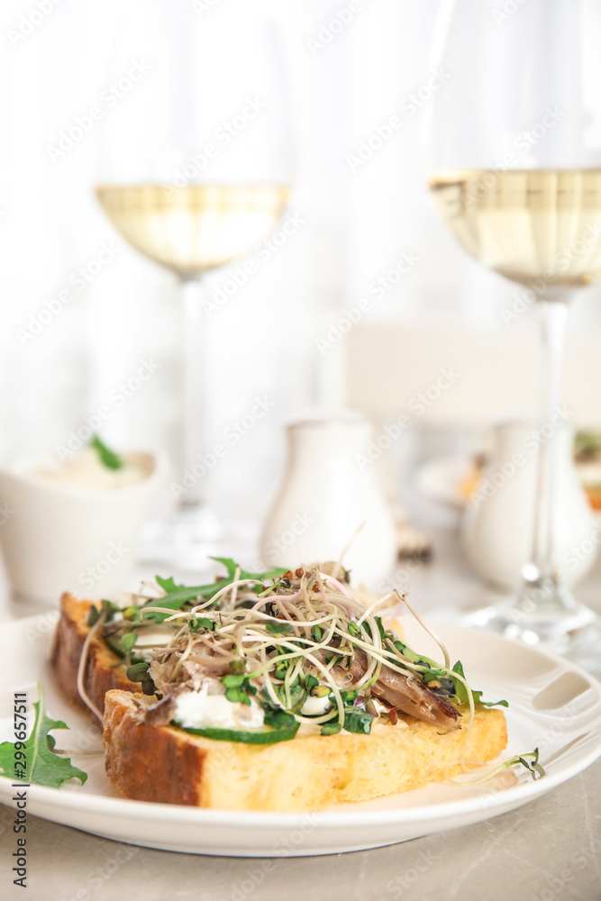 Delicious bruschettas with fish on marble table Delicious bruschettas with fish on marble table