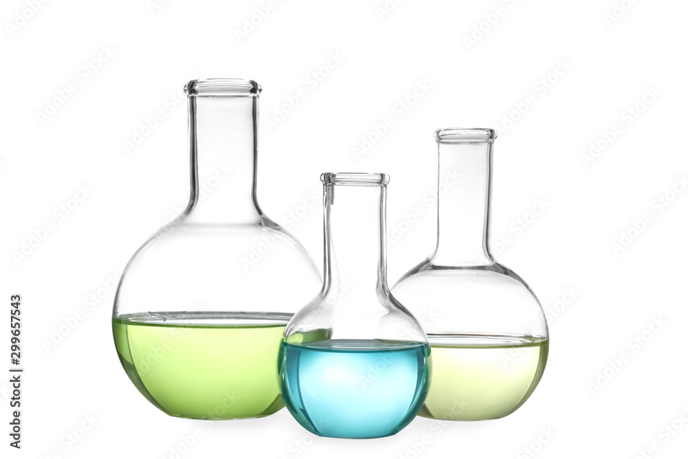 Glassware with liquids isolated on white. Laboratory analysis Glassware with liquids isolated on white. Laboratory analysis