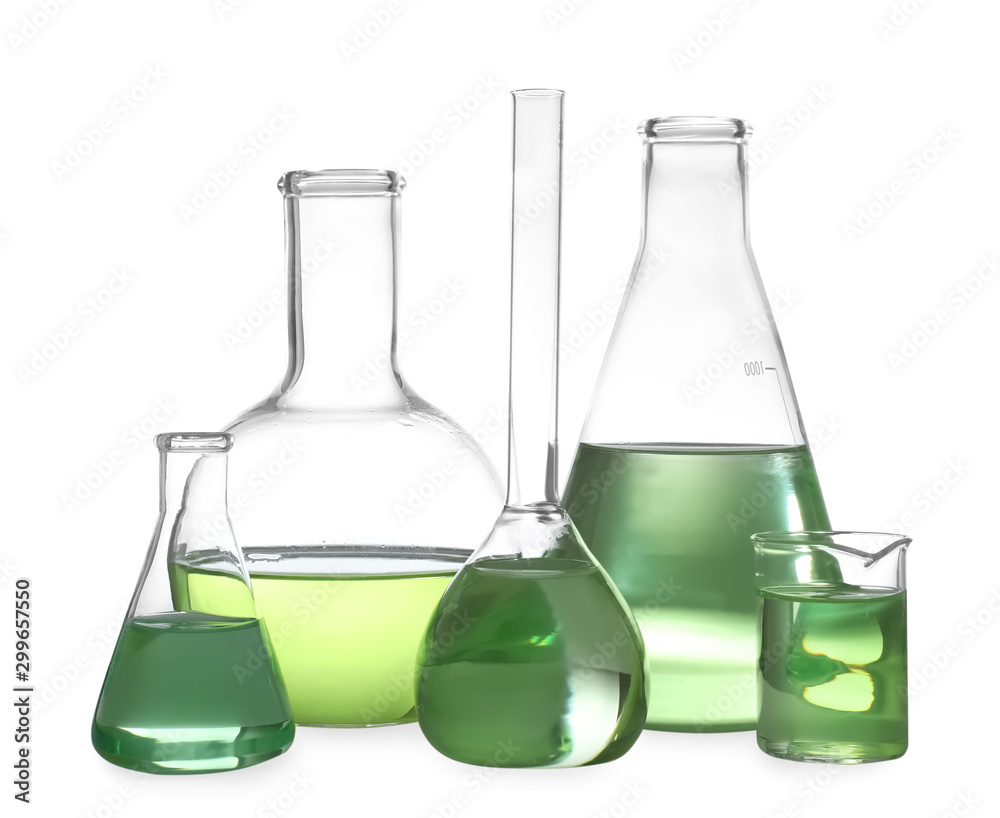 Glassware with liquids isolated on white. Laboratory analysis Glassware with liquids isolated on white. Laboratory analysis