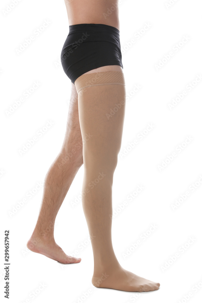 Man wearing compression stocking isolated on white, closeup