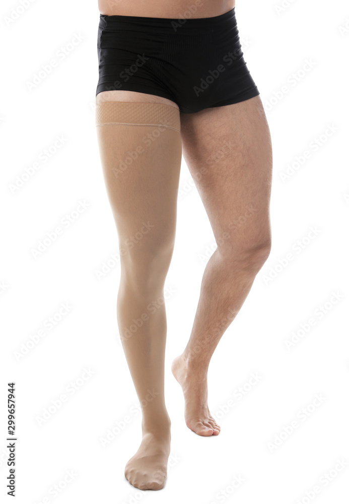 Man wearing compression stocking isolated on white, closeup